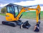 Аренда мини экскаватора JCB 8030 с гидромолотом.